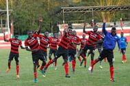 AFC players do a traditional AFC dance